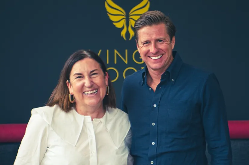April Hutchinson TTG and David Ox stand in Winged Boots shop