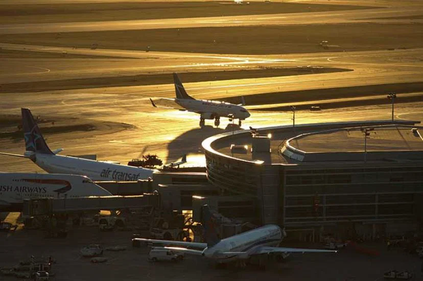 Jets at terminal at sunset