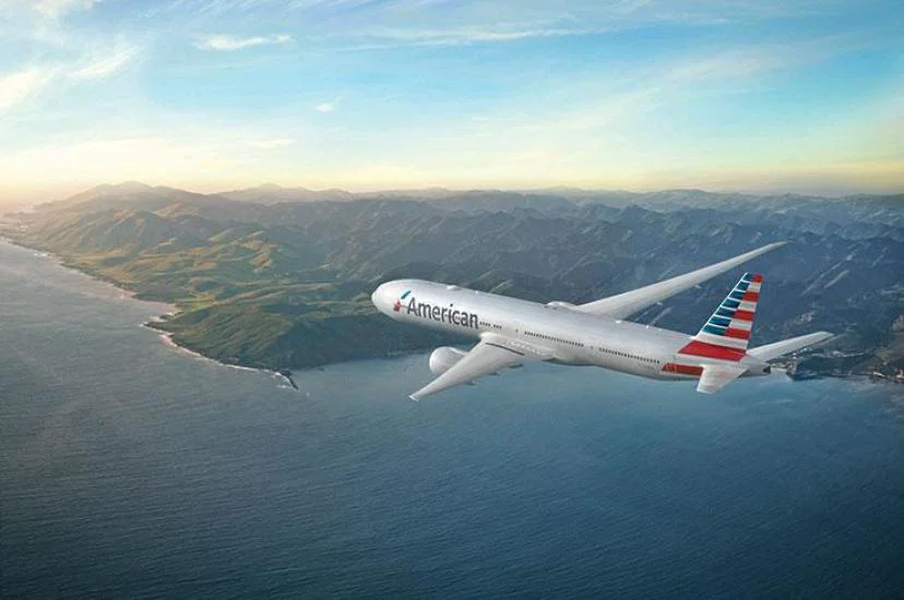 American Airlines 777-300 over coastline