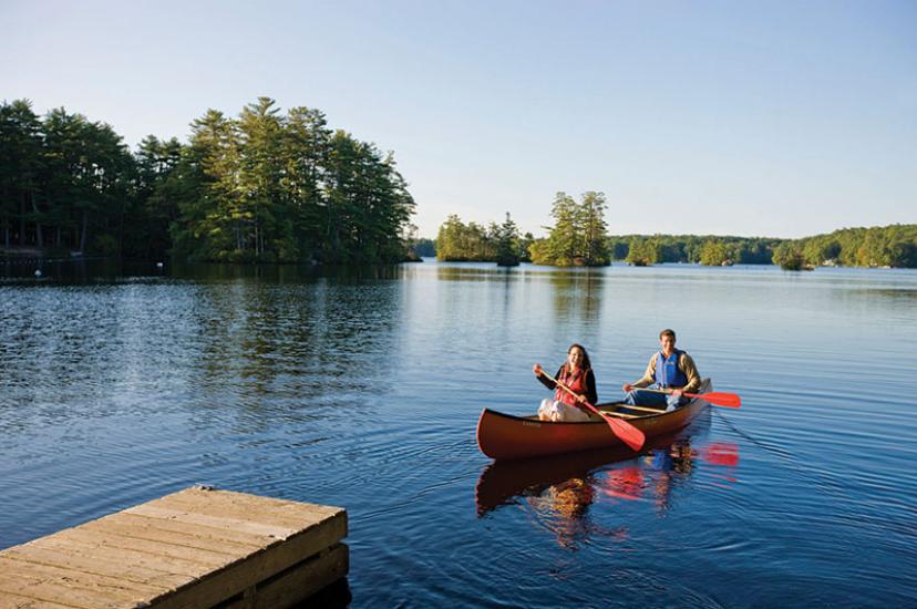 a-couple-canoeing-on-pawtuckaway-lake-in-new-hampshires-pawtuckaway-state-park_15673817713_o.jpg