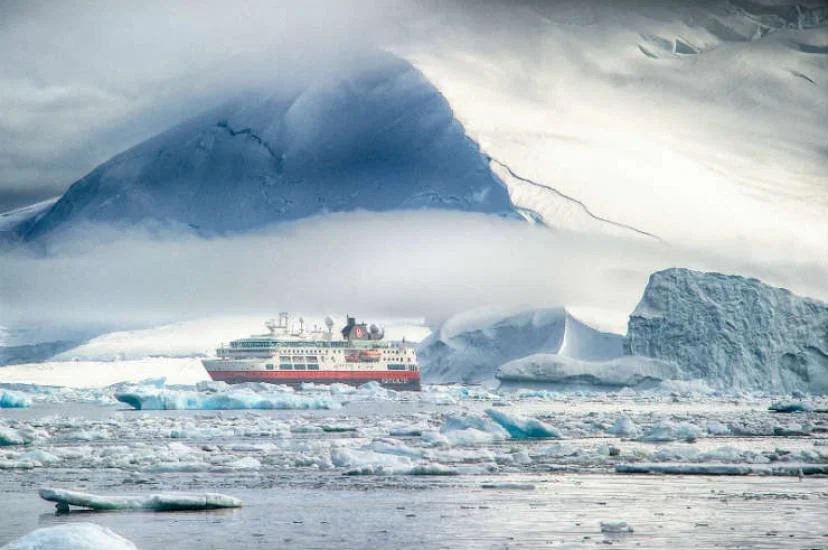 Hurtigruten ship sailing in Antarctica