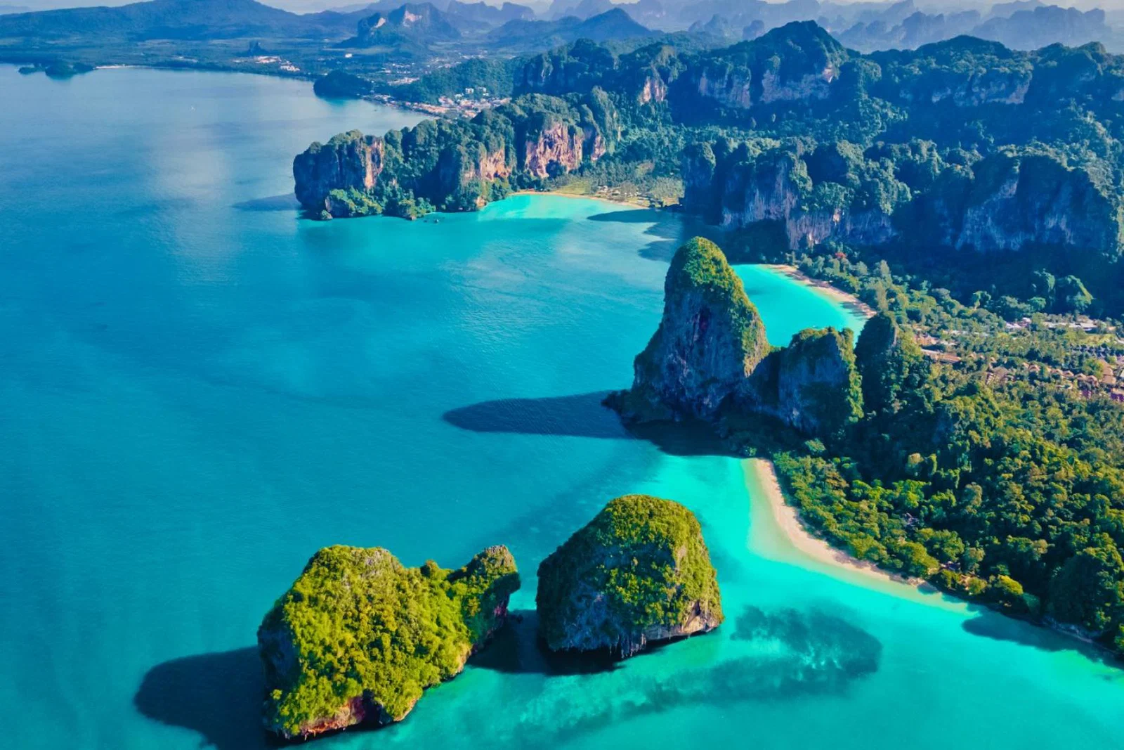 Blue water, beach and lush coast