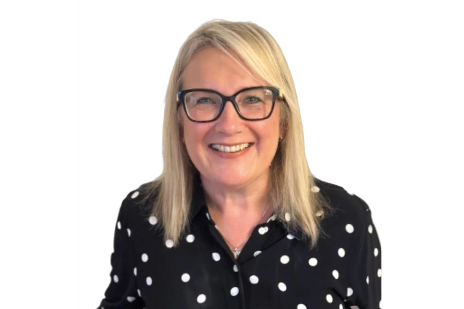 Smiling woman with blonde hair and glasses