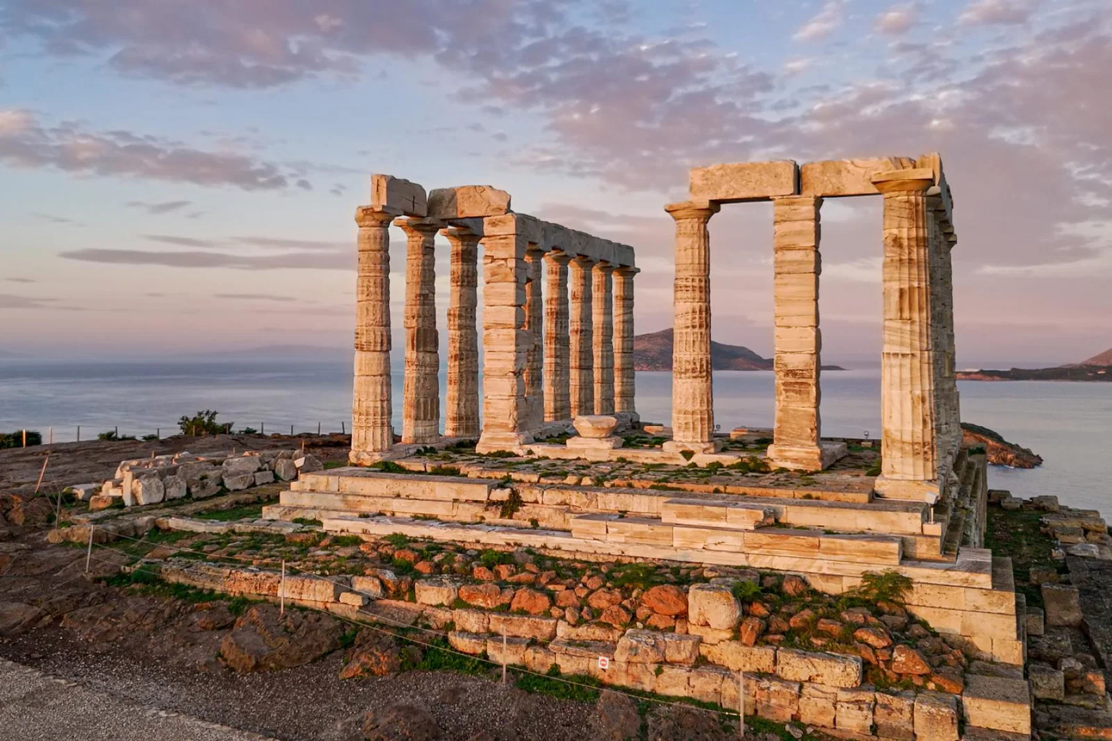 The Temple of Poseidon at Cape Sounion overlooking the Aegean Sea