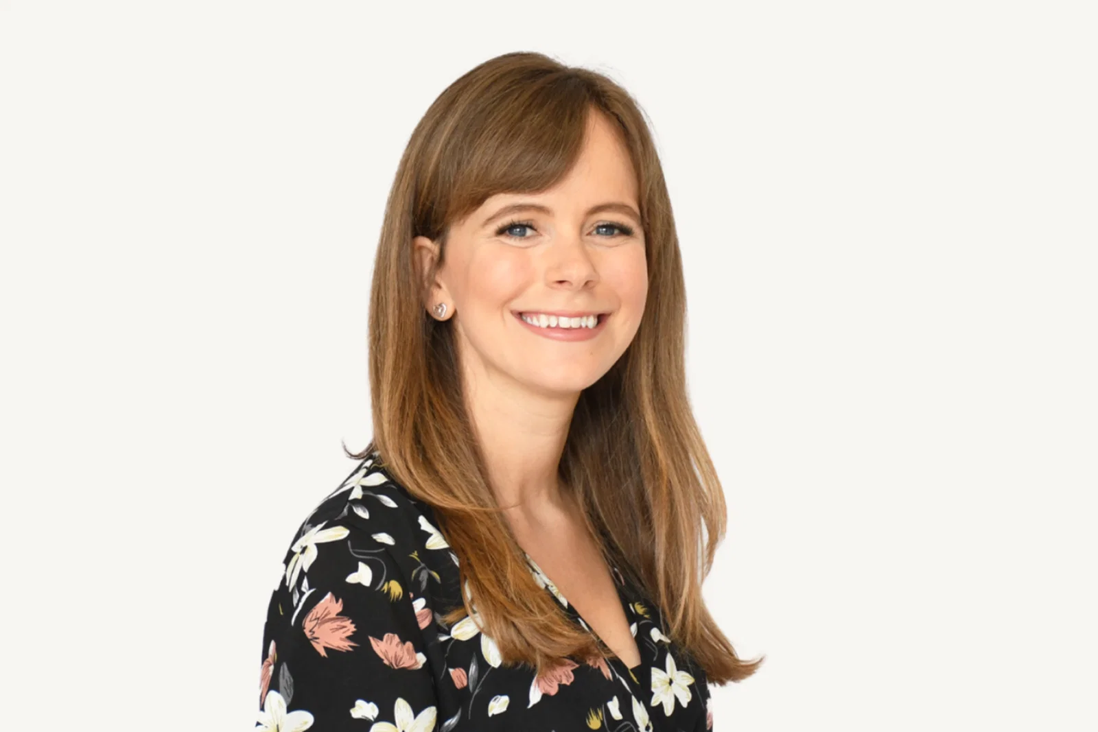 Woman with long brown hair smiling 