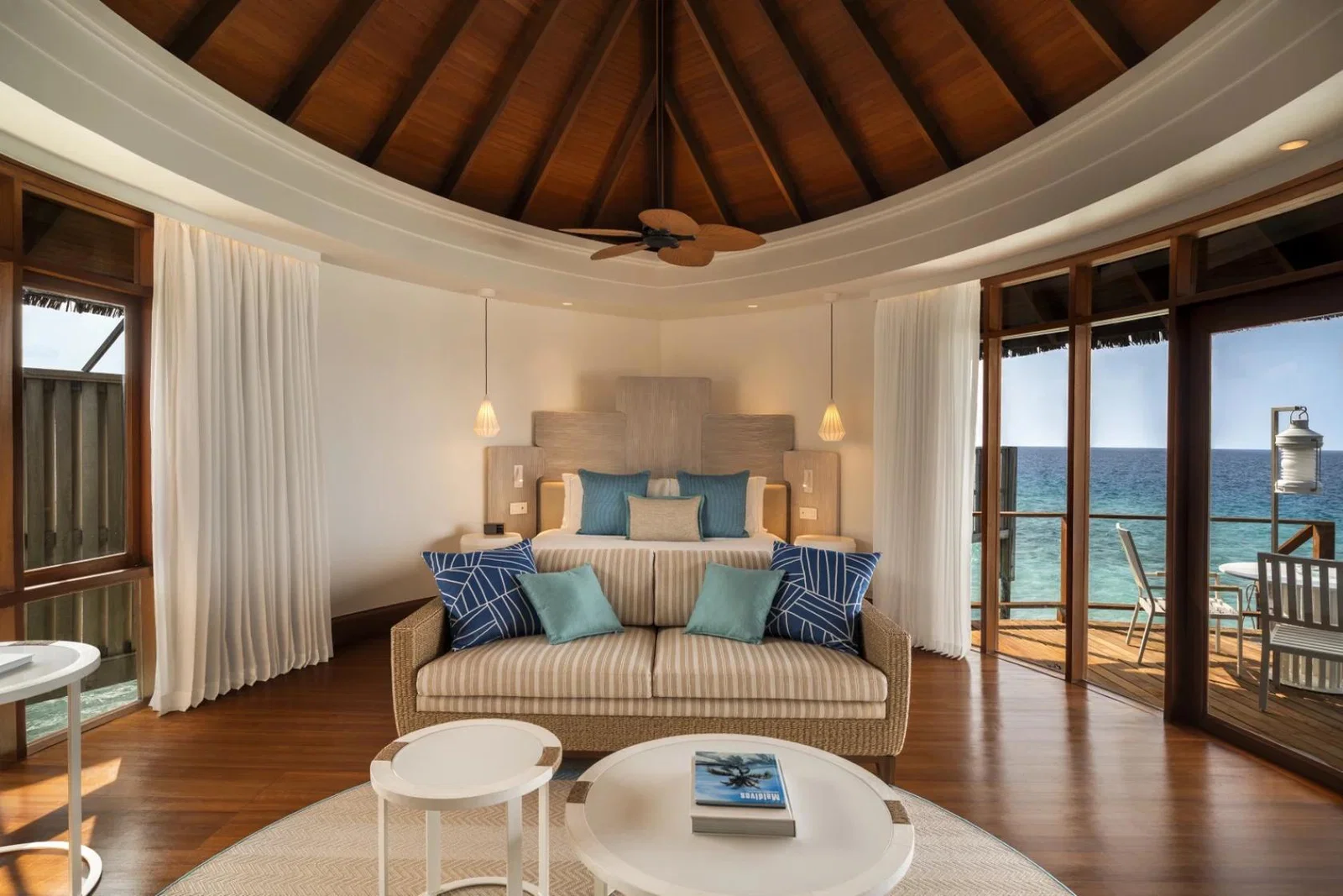Constance Halaveli Maldives water villa bedroom
