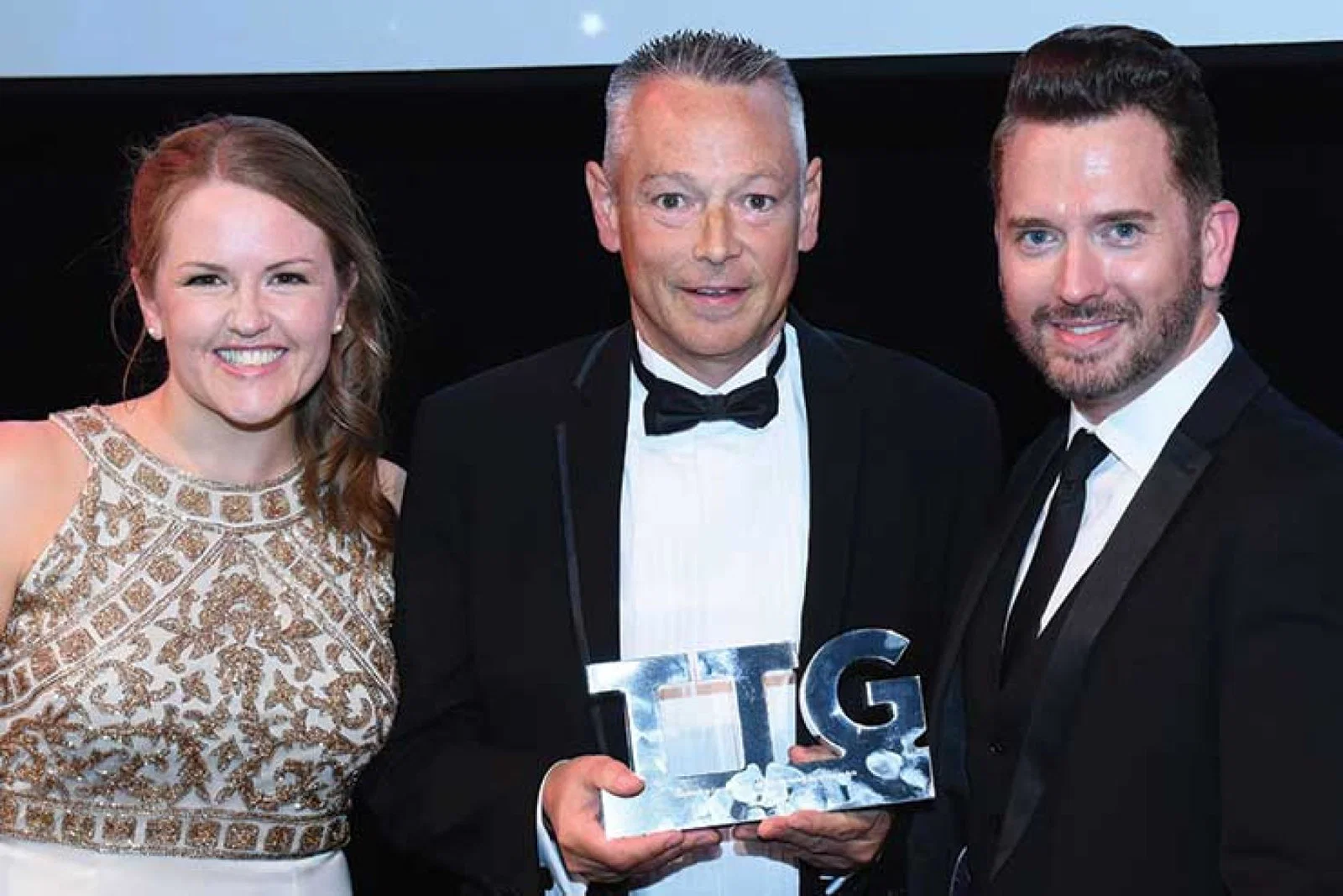 Miles Morgan receiving his TTG Outstanding Contribution award