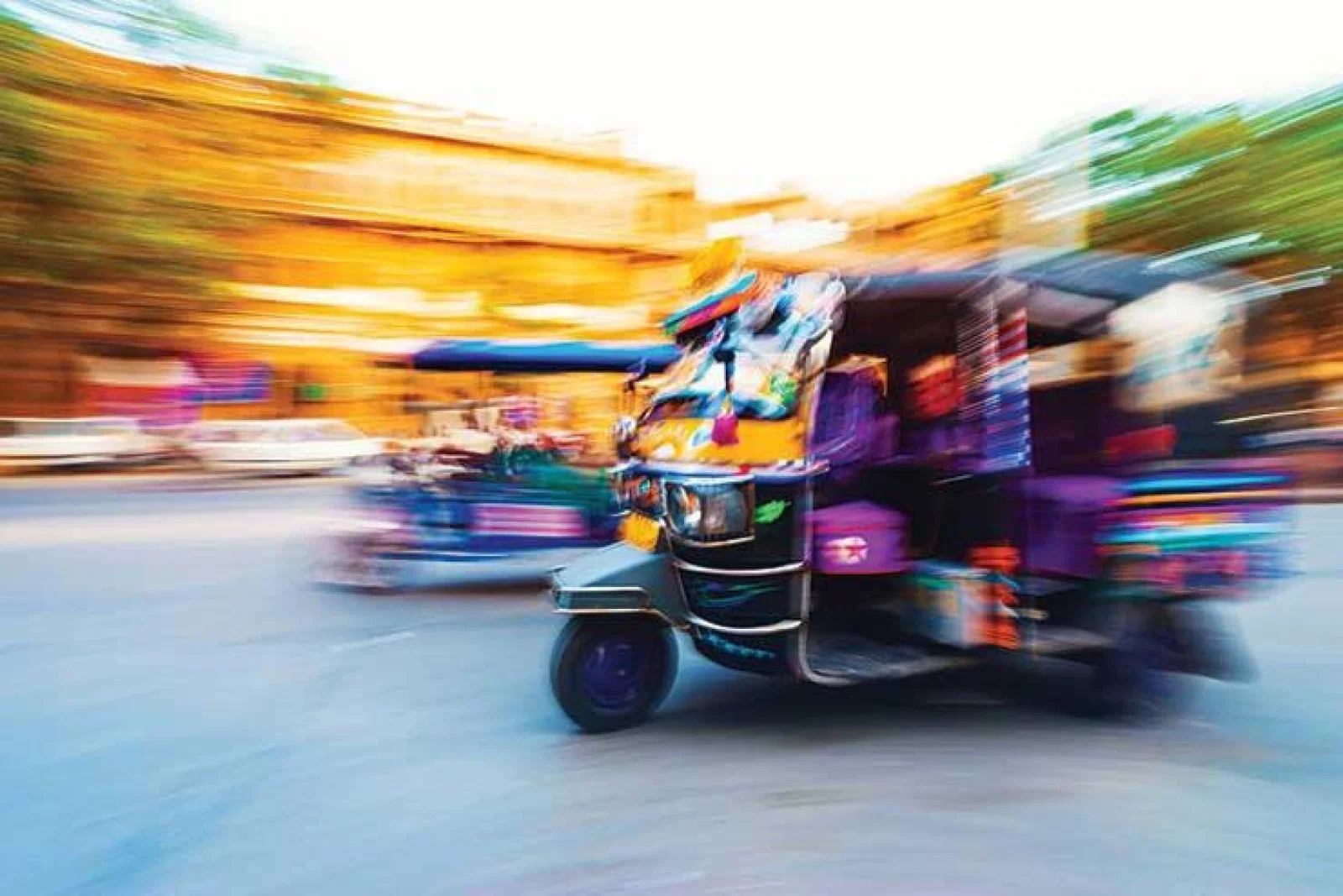 Speeding tuk tuk iStock-503807216