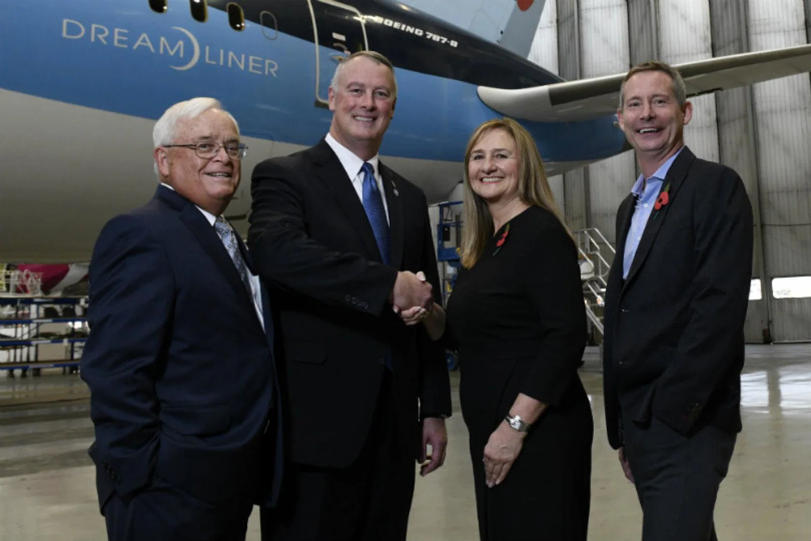 Andrew Flintham and Dawn Wilson from Tui, and Greg Donovan and Jack L. Ryals from the airport