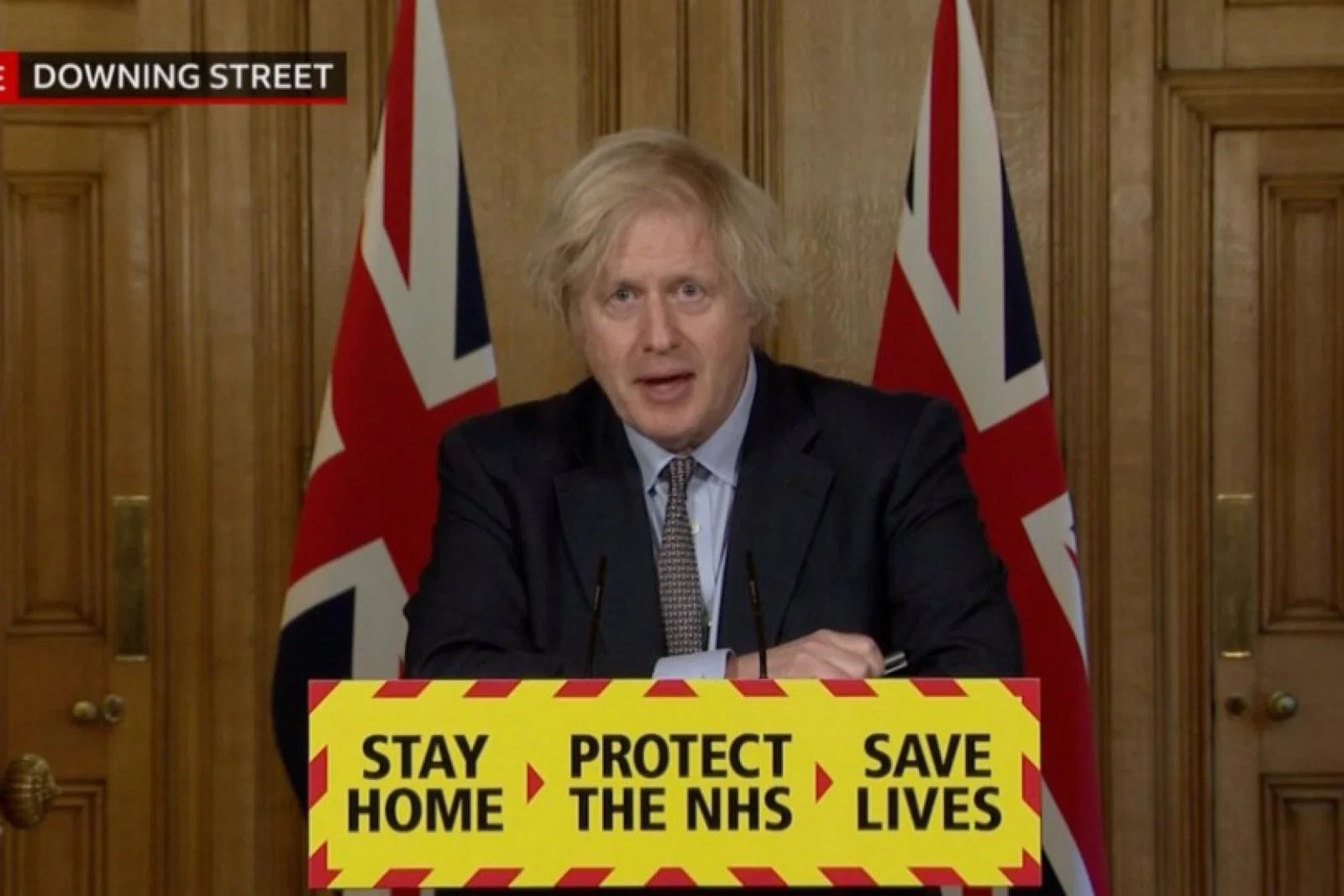 Johnson was asked why travellers stuck in red-listed countries can't self isolate at home rather than a hotel (Credit: BBC News)