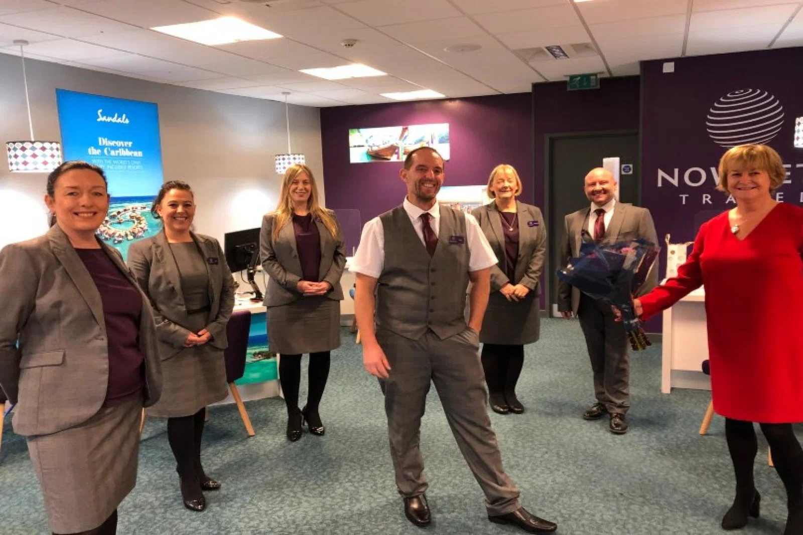Paul Johnstone (centre) opened the Newcastle store in December 2020