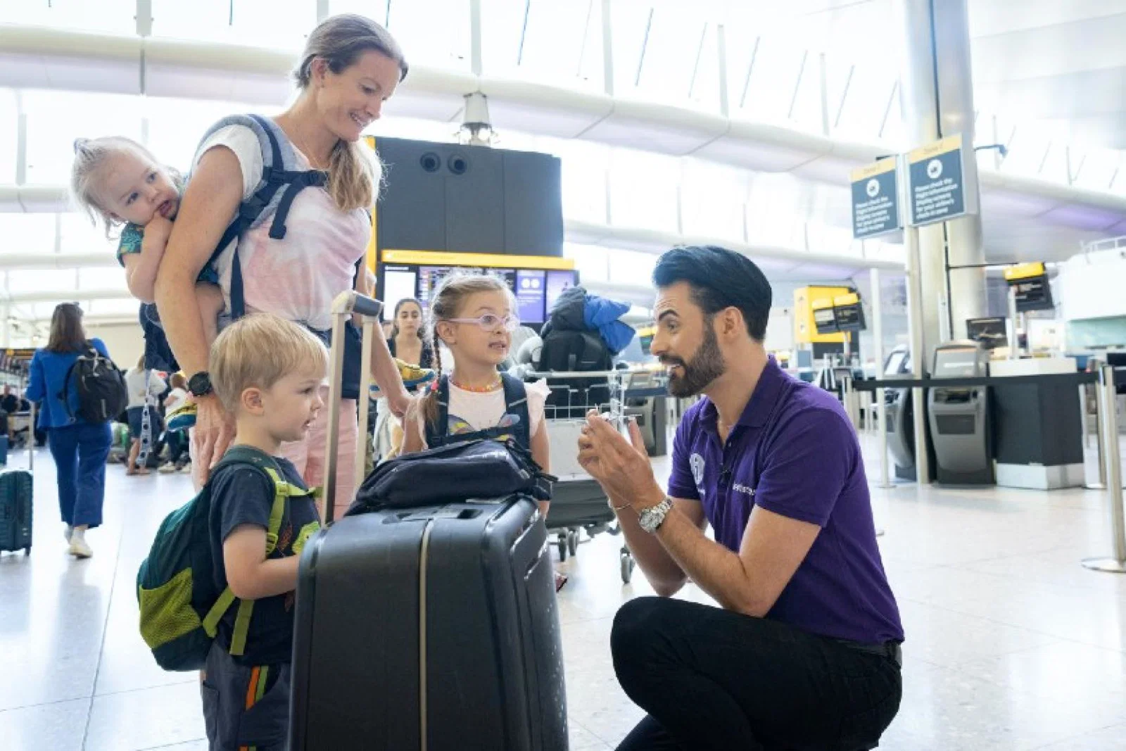 Rylan has become an honorary member of Heathrow's "purple people" crew (Credit: Heathrow airport)