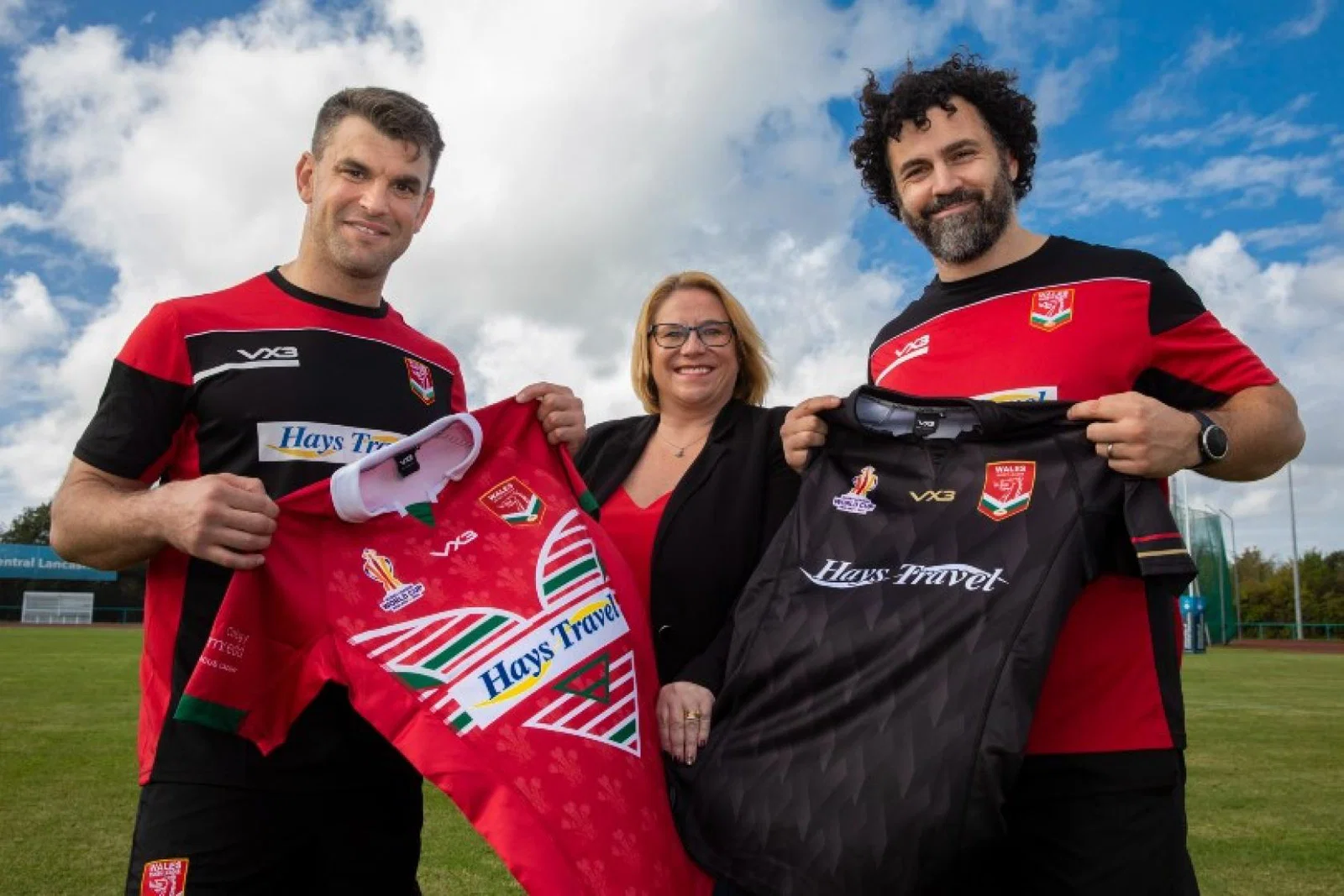 Toni Smith, Hays Travel North West regional manager, with Wales's Elliot Kear and Rhys Williams (Credit: Mandy Jones Photography)