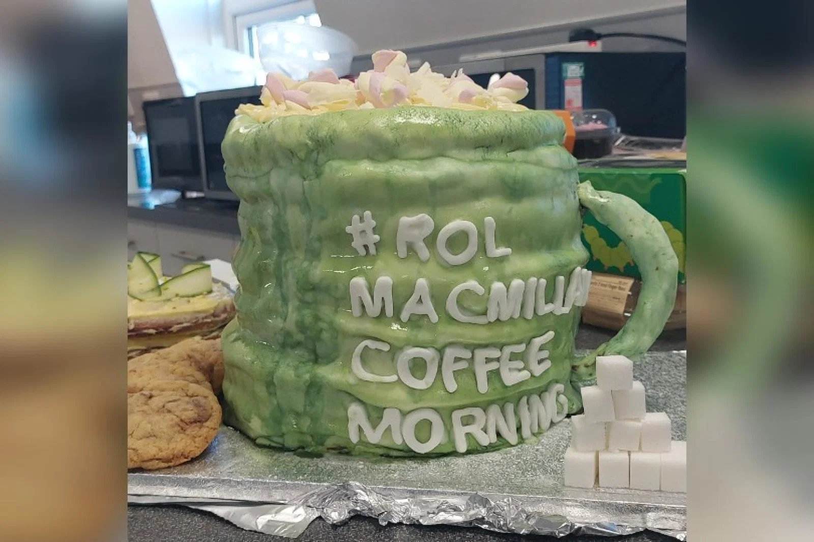 The firm held a coffee and cake morning to raise the money