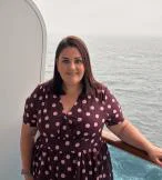 Woman smiling on cruise balcony