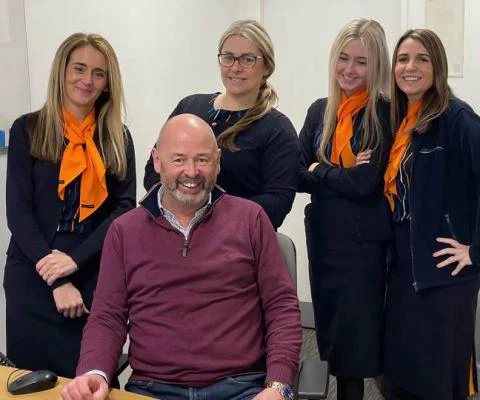 Don Bircham pictured with members of the Hays Travel North West team during peaks