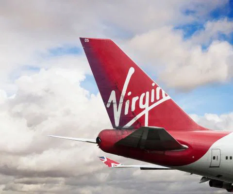 A Virgin Atlantic aircraft pictured stationary at an airport