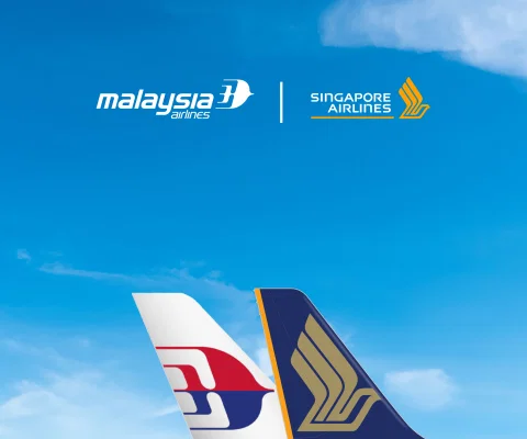 Image of Malaysia Airlines and Singapore Airlines tails and respective logos