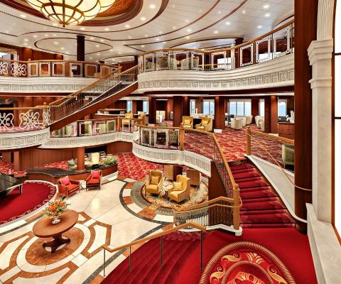 Cruise ship lobby with luxurious red and gold furnishings 