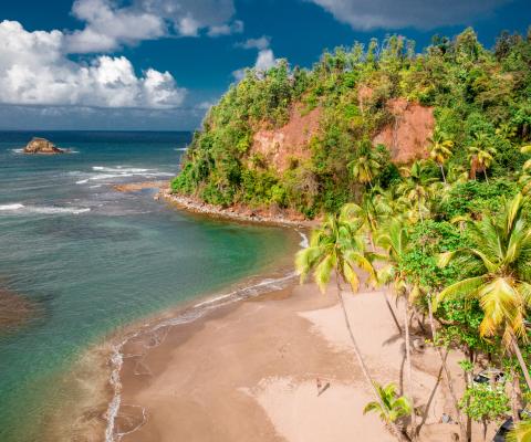Blue waters and sandy beach of Batibou Beach, Dominica