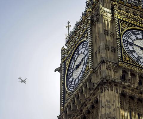 Big Ben with aircraft (stock)