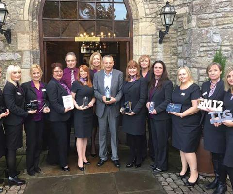 Miles Morgan with store managers