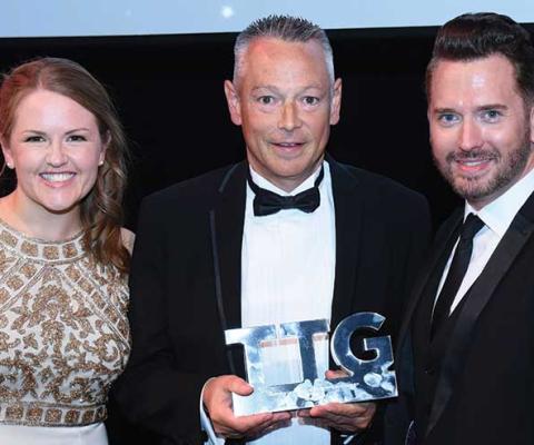 Miles Morgan receiving his TTG Outstanding Contribution award