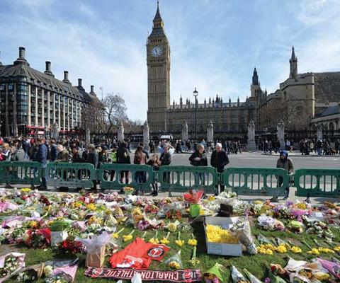 Memorials in Parliament Square. Credit: Press Association