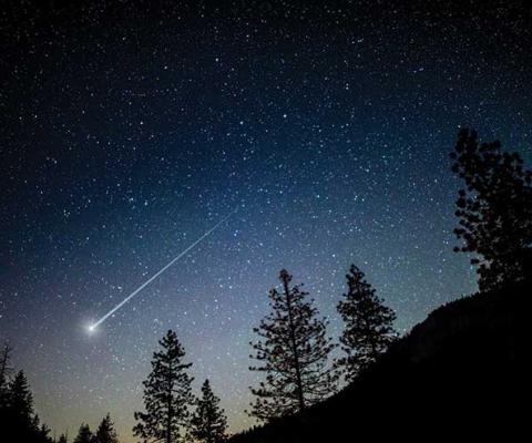 Shooting star in the night sky