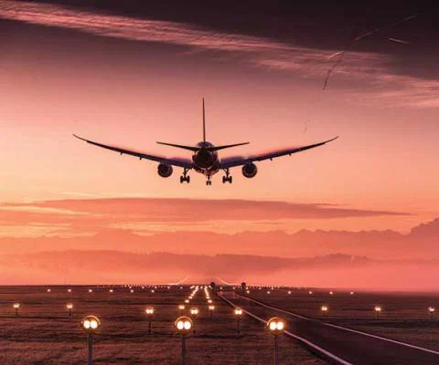 Jet airliner at sunset