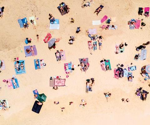 Sunbathers on sunny British beach