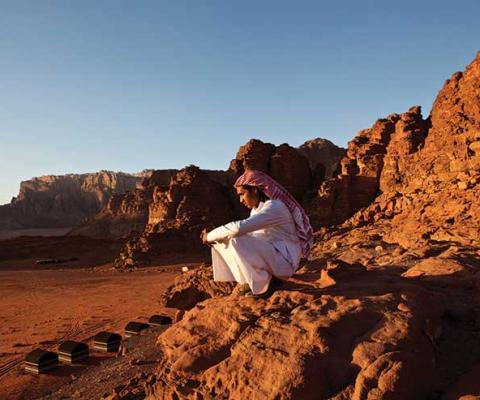 Man sitting in rocks in Jordan