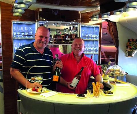 John (left) and Greig flying with Emirates v2.jpg