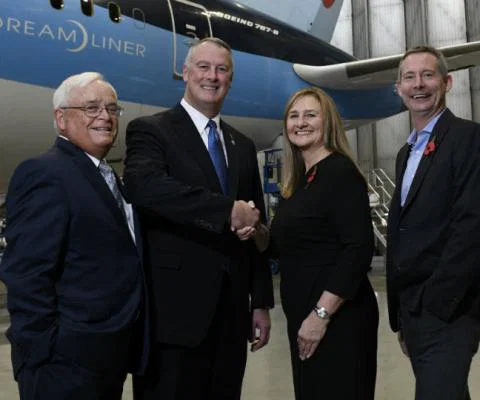 Andrew Flintham and Dawn Wilson from Tui, and Greg Donovan and Jack L. Ryals from the airport