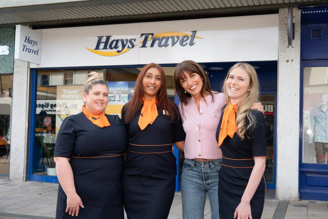Davina McCall pictured with the team at Hays Travel in Bromley Davina McCall pictured with the team at Hays Travel in Bromley