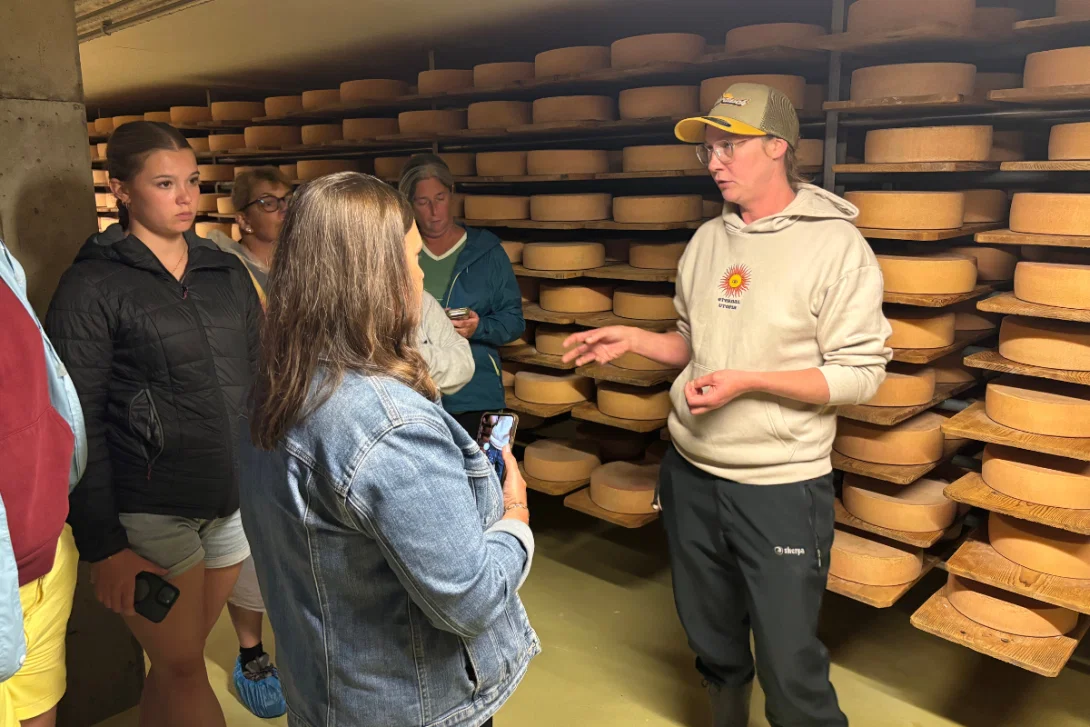 Daria Faust guides the tour of the farm's cheese cellar alpine-cheese-cellar-tour