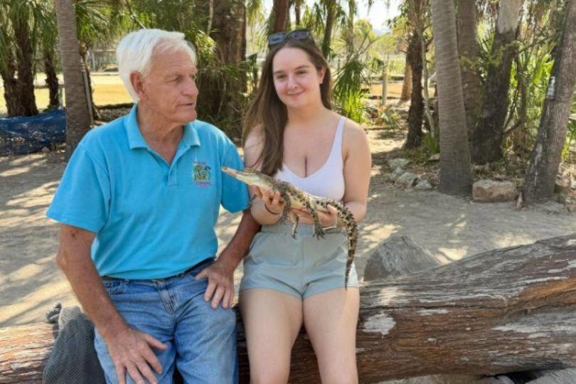 Megan Turner Megan Turner holding a croc on Prestige Travel fam to Queensland