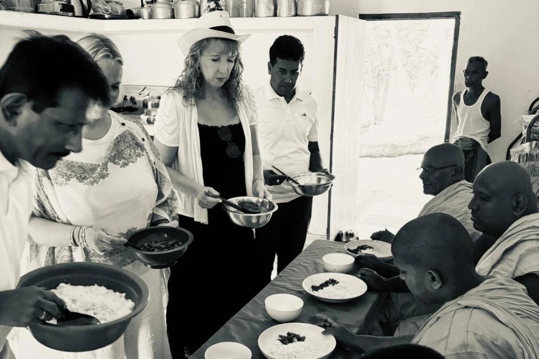 Serving food to monks in Sri Lanka Serving food to monks in Sri Lanka
