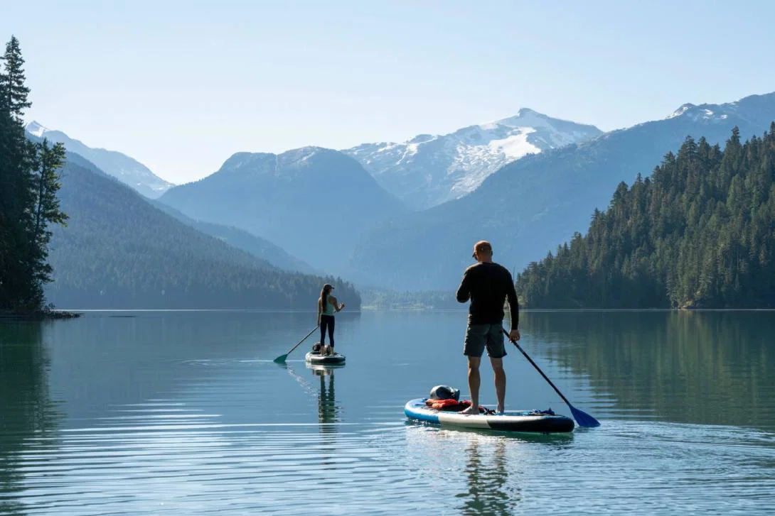 People paddleboarding in Canada People paddleboarding in Canada