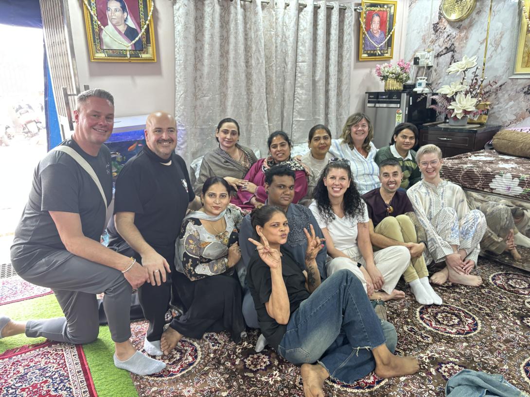 (Credit: Jessica Reid) Group of TTG LGBT Ambassadors and transgender family smiling at camera
