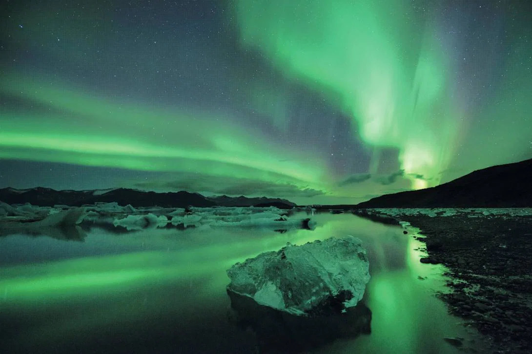 Travellers are planning astro-tourism trips, such as seeing the northern lights over Reykjavik. The Northern Lights as seen over Reykjavik.