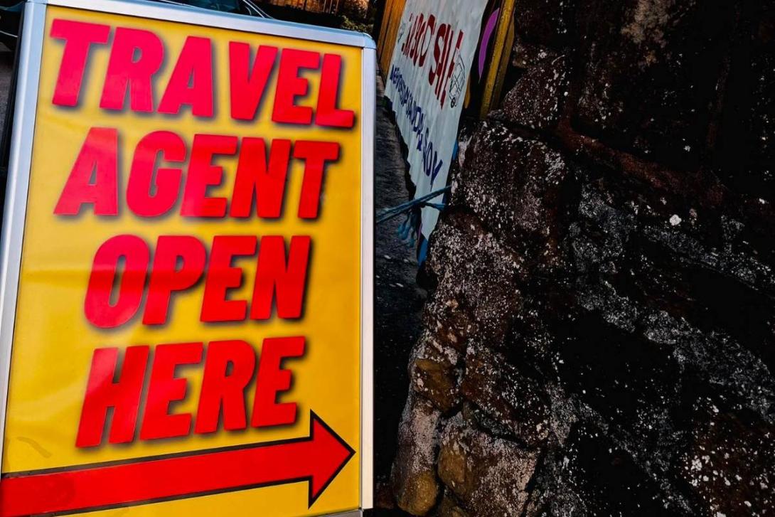 Travel agent sign in Abakhan Village Travel agent sign in Abakhan Village