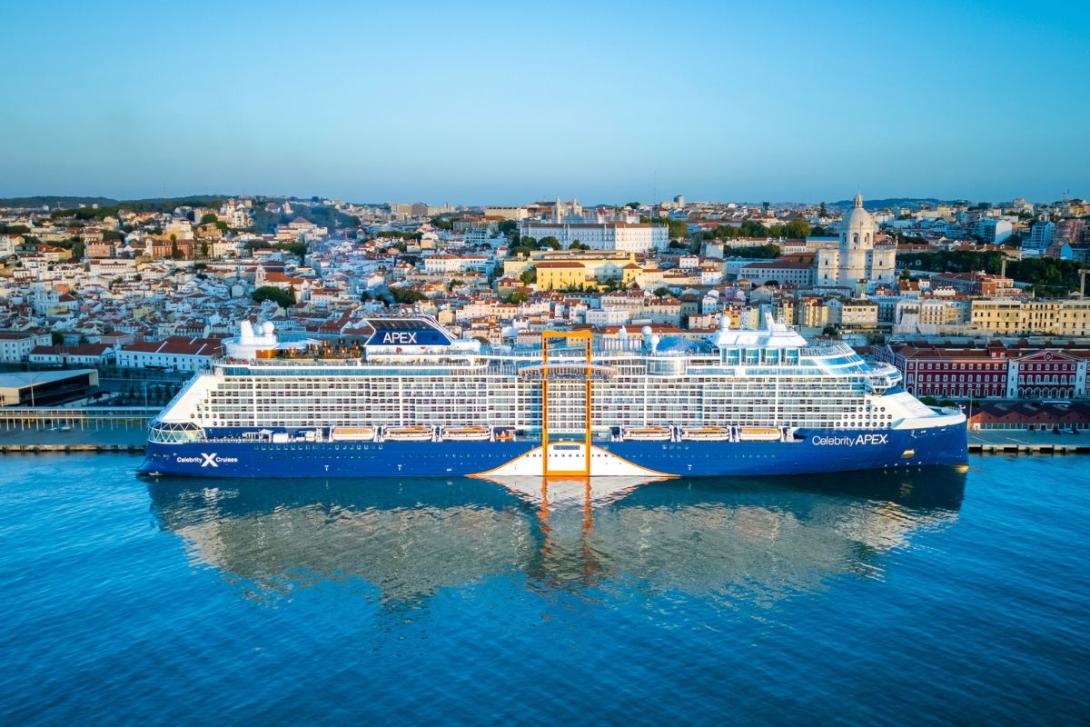 Celebrity Cruises Celebrity Apex ship docked up with Lisbon city landscape in the backgroun