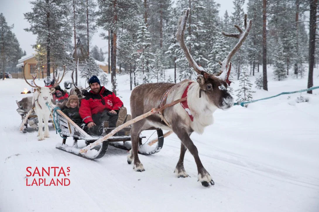 Guests enjoy a sleigh ride at Santa's Lapland