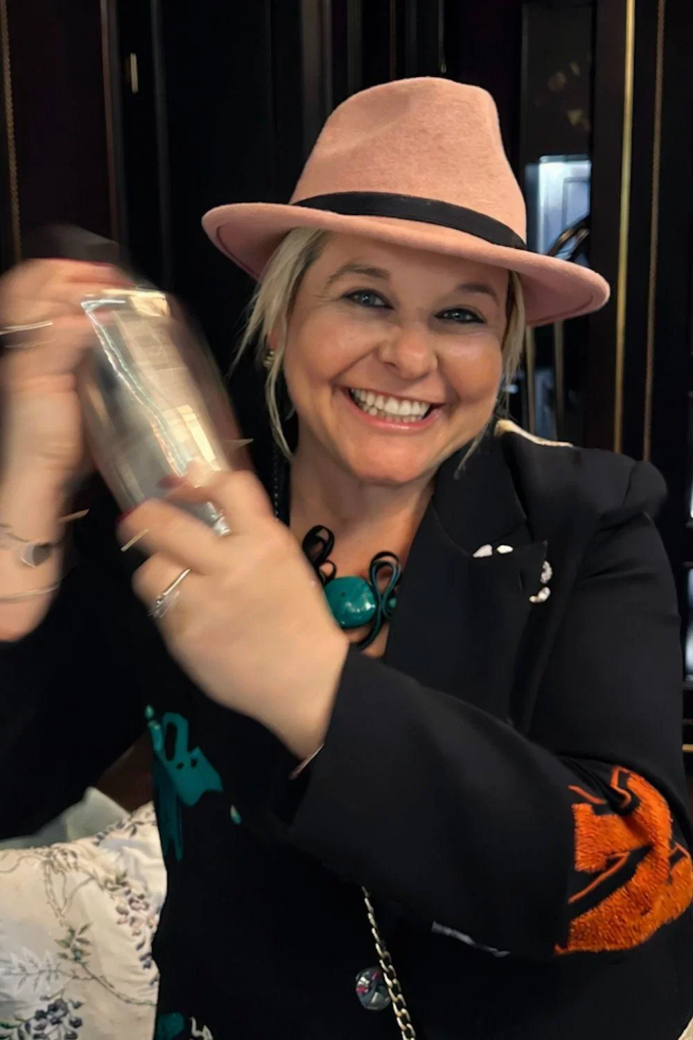 Woman with hat smiling