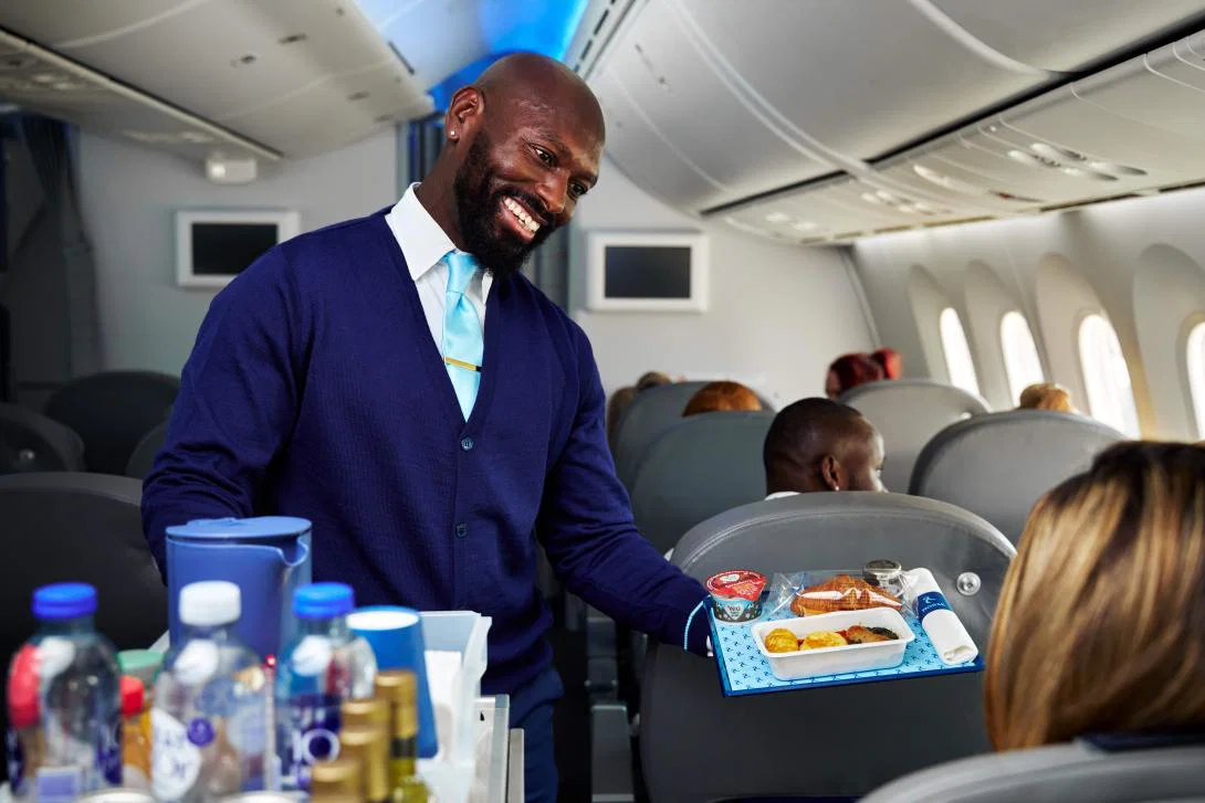 Passengers enjoying food onboard with Norse