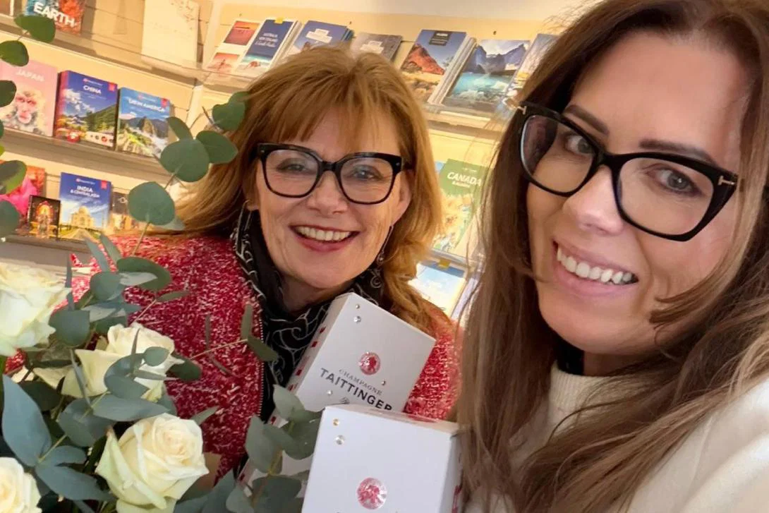 Selfie of Maggie Rogers holding prosecco and flowers Selfie of Maggie Rogers holding prosecco and flowers