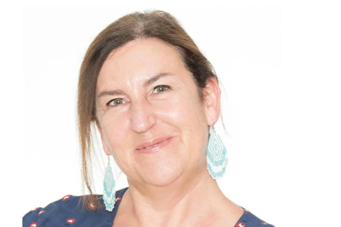 Smiling white woman with brown hair