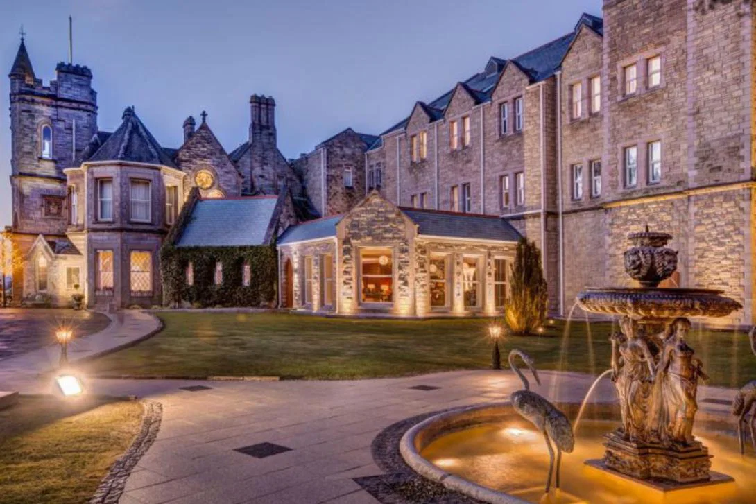 A driveway leading up to a castle hotel
