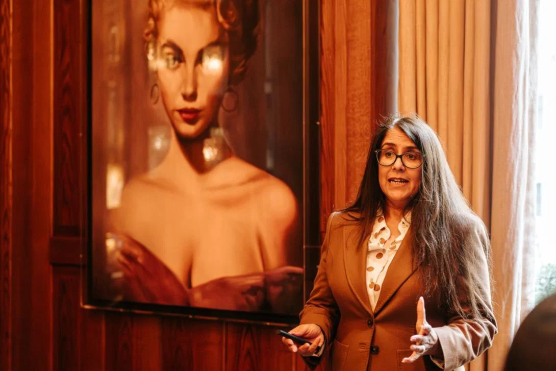 Woman speaking at event